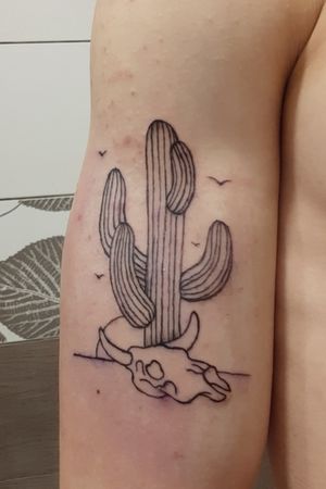Simple cactus, done by my ex-classmate. His first tattoo on human skin.. Planning to get it fixed up/shaded.Funny story, the next morning, I woke up at 5:40, had to be at work at 6:30... Accidentally put some tooth paste on it instead of the cream... So yeah.. Washed it later and put the creme on.  