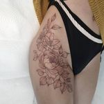 Floral botanical arrangement on hip, flower tattoo