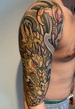 Illustrative organic dragon and claw designed and tattooed by Kevin Farrand 