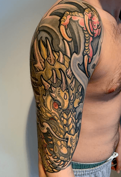 Illustrative organic dragon and claw designed and tattooed by Kevin Farrand 