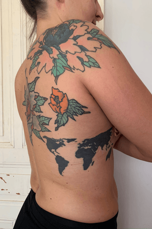 Peony flowers and world map