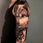 Wolves sleeve tattoo in black and grey realism, London, UK | #londontattooartist #blackandgreytattoos #wolftattoo #bestrealistictattoos