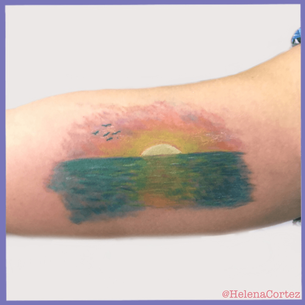 watercolor sunset tattoo