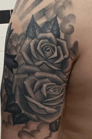 Healed black and grey roses by Chris Lambert. Tattooed at snake and Tiger in Leeds city centre, Uk. Please email or call to set up a consultation. Www.chrislamberttattoo.com