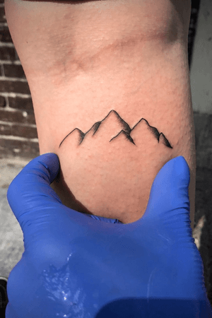 Mountains on leg (hand for size)