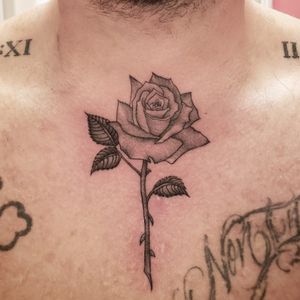 Simple realistic rose on chest/ throat tattoo done in Las Vegas by @elekkstasy 