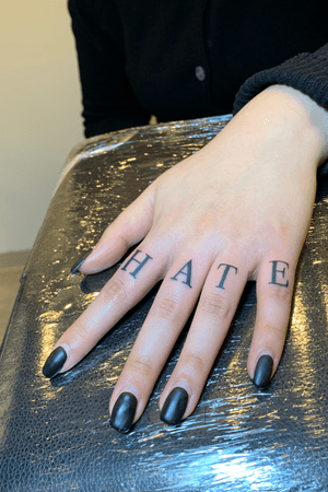 lettering tattoo for woman finger