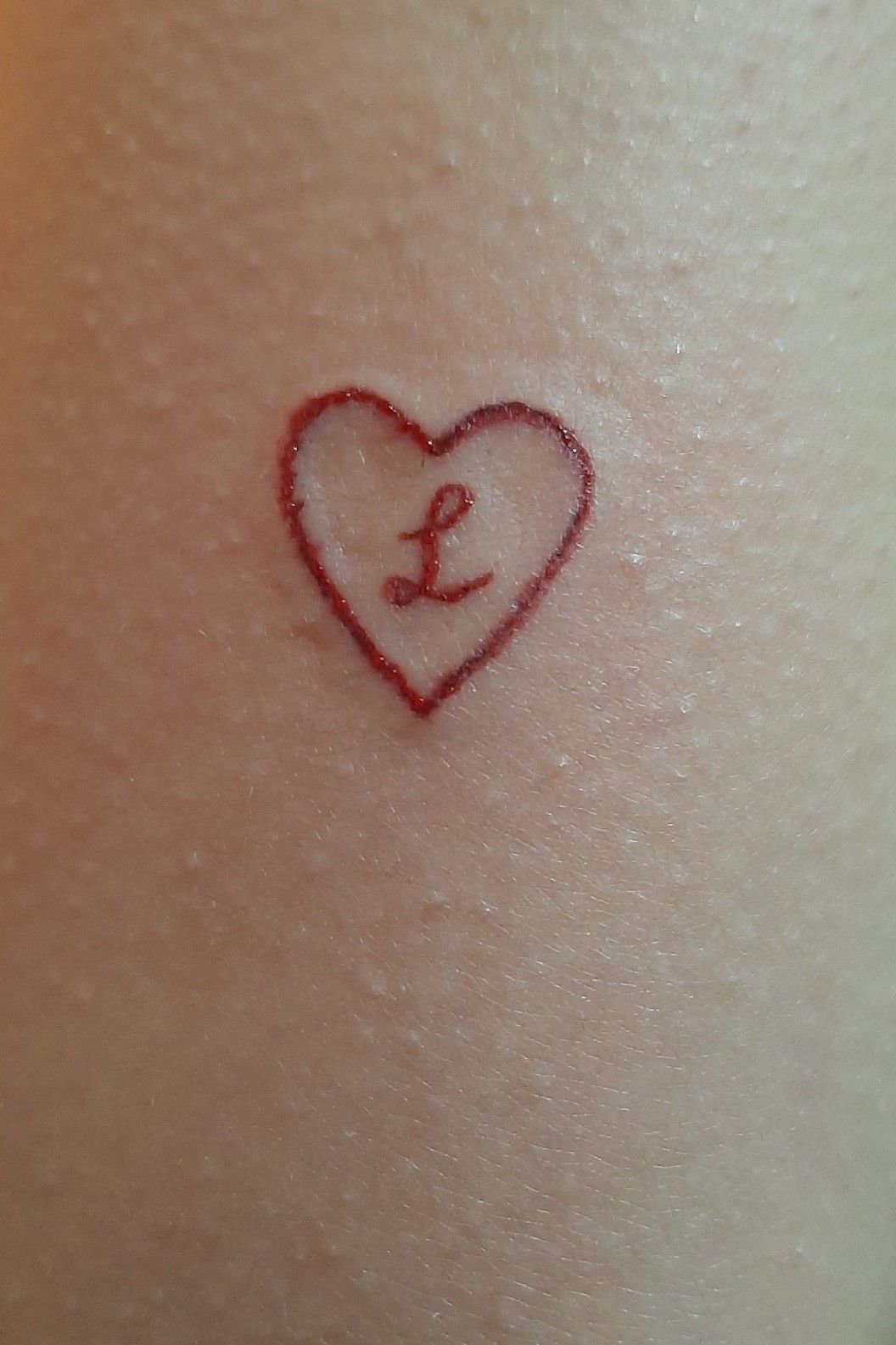 Tattoo of LNCC heart Bond tattoo  custom tattoo designs on  TattooTribescom