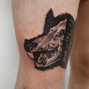 Half of boar skull and boar tattoo black work #boartattoos #boar 