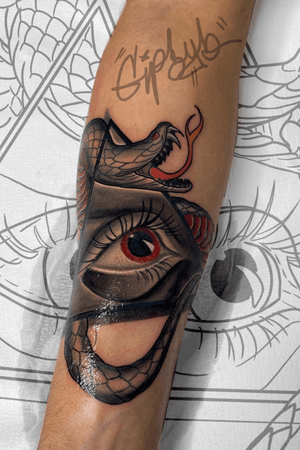 Snake and eye tattoos 