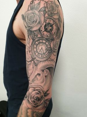 Black and grey sleeve #blackandgreytattoo #blackandgrey #roses #clock #compass #goattattoo #goat