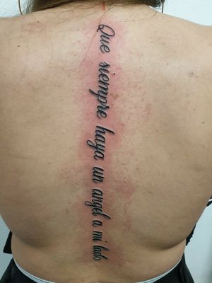 Script tattoo on spine #scripttattoo #script #spinetattoo