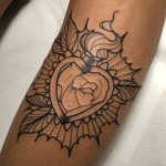 Sacred Heart and rose on calf