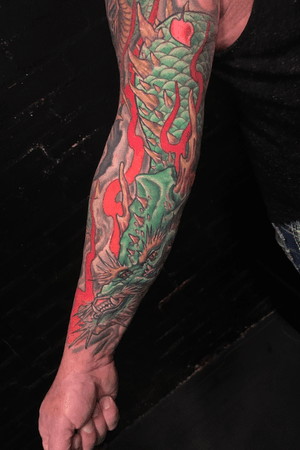Dragon tattoo that is coming to life from the geisha.