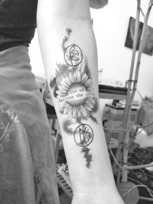 Tattoo of sigils with a custom abstract sunflower smoky watercolor background. #finelinetattoo #blackandgrey #watercolortattoo