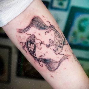 Single needle Koi tattoo