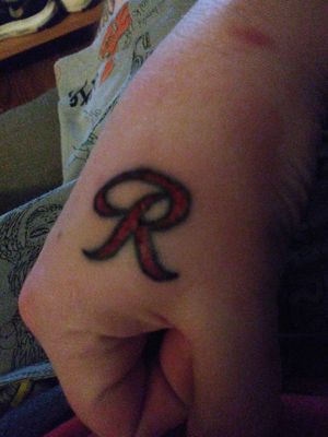Rainier beer R still in the healing process. Done by Rest at High priestess in Eugene, Oregon.