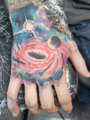 #firstsession #galaxytattoo #blackhole #handtattoo #colorfultattoo #universetattoo Will look much better finished.