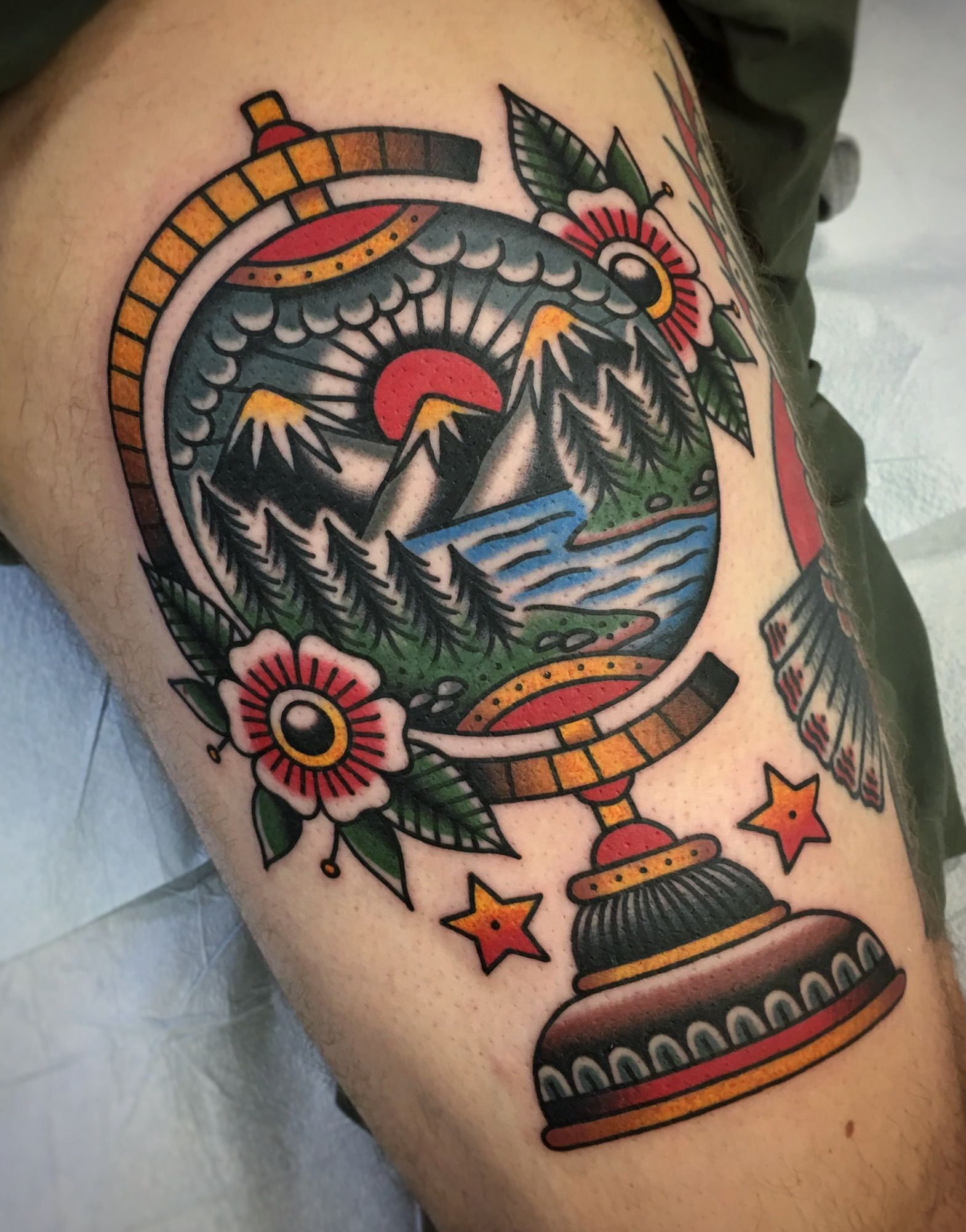 Traditional globe and flowers tattoo  Tattoogridnet