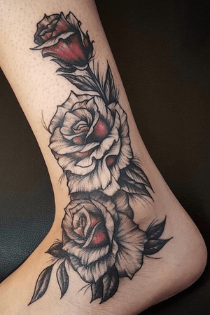Tattoo on top foot, ankle and lower leg