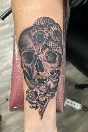 Skull and snake tattoo 