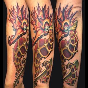 Red Seahorse tattoo done by Jason Stephan