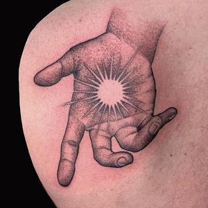 Enlightened Hand tattoo done by Anna Wolff