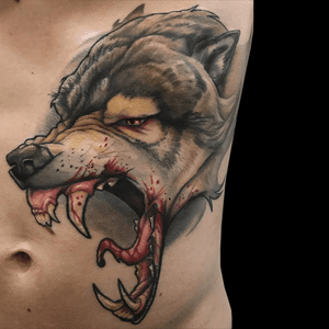 Stomach Wolf tattoo done by Nick Mitchell
