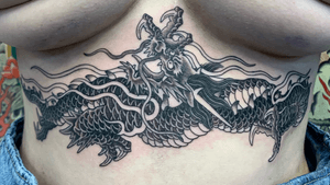 Black and grey dragon underboob tattoo, 4.5 hours #dragon #bngdragon #dragontattoo #underboobtattoo #japanesedragon #finelinedragon #irezumi #ryu #jarradchivers