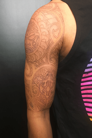 Right Upper Arm Tribal Half Sleeve. Tiki Face on Shoulder and Turtle/Gecko on Bicep were templates found online and the rest was freehand.