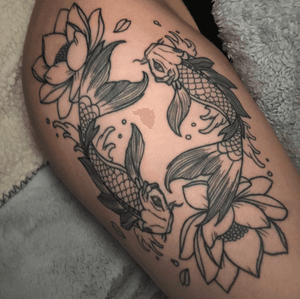 Two gorgeous koi carp with pretty lil flowers, my first big tattoo ! Still debating whether to colour but I do love just the black inc, done by a great guy called Sam at The Pearl in Sheerness, Isle of Sheppey, Kent