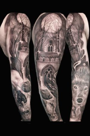 Impressive black and gray realism sleeve tattoo combining a skull and architectural elements by Mauro Imperatori.