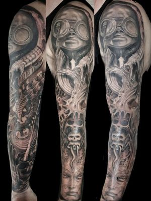 Impressive black and gray skull with goggles design by Mauro Imperatori, perfect for a sleeve tattoo.