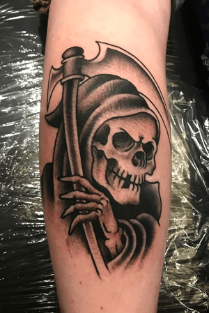 Black and grey American traditional Reaper done on my left calf