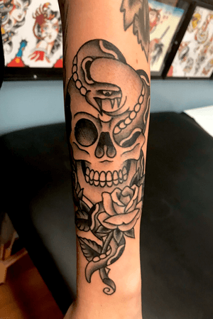 Black and grey American traditional Skull and snake (my favorite) 
