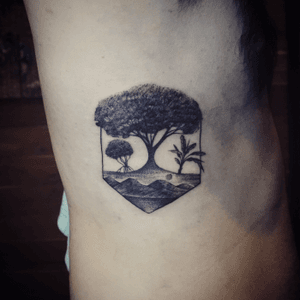 Blackwork tree tattoo with mountains - Baan Khagee Tattoo Chiang Mai
