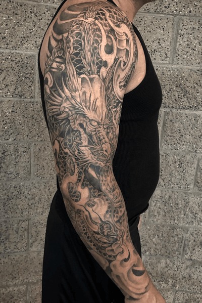 Healed sleeve finished over a couple months! This guy is crazy lol the homie/neighbor Fong got his first tattoo in October and now has two full sleeves. Always a good time tattooing you bro. Go check out his barbershop next door to the shop. It’s either dedication or addiction but either or u a beast lol. Can’t wait for the next piece! #peaces #dragonsleeve #blackandgrey #sleevetattoo #skanvas #oc #cypress #longbeach #artist #arte #inkaddiction #inked #guyswithtattoos #crysanthemumtattoo #lotustattoo #asiantattoo 