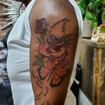 Color works on dark skin #neotraditional #neotrad #darkskin #rosary #floral #roses #rosebud #religioustattoo #colortattoos #boldwillhold #whipshaded # 