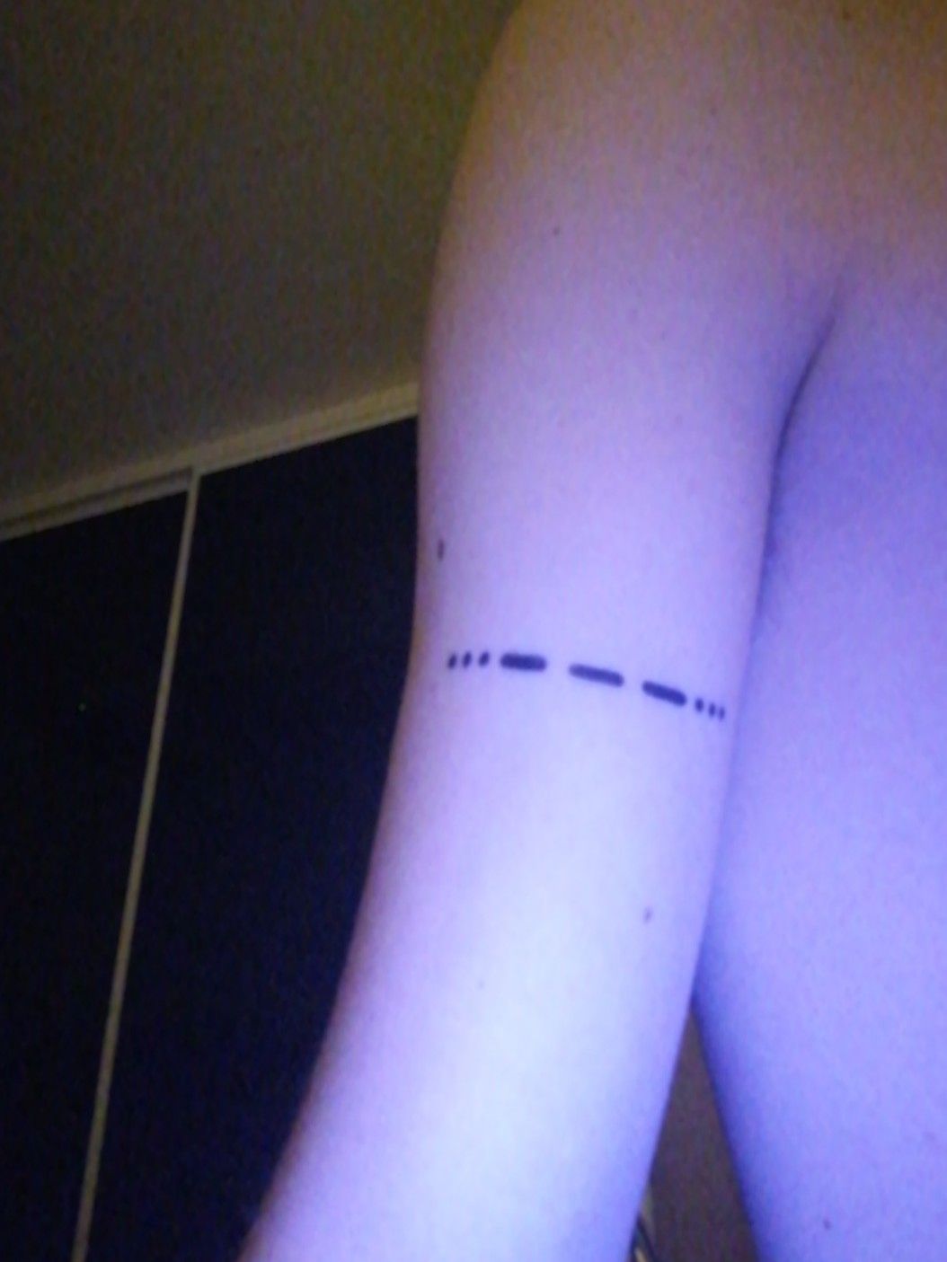 Unlocking Meaning in Ink The Fascination of Morse Code Tattoos