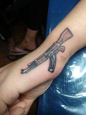 Mini AK-47 on side wrist on a lady client today...#wristtattoo #dainty#femininetattoo #smalltattoo  #guntattoo #bangers #surrey #vancouver #vancouvertattooartist #customtattoo #originaldesign #byjncustoms ▶