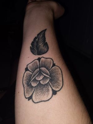 Semi Colon tattoo, personalized as a rose with a leaf. Located on right forearm. 