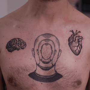 Brain and heart tattoo.