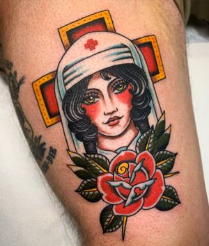Tattoo by Dennis Duran #DennisDuran #traditional #color #roseofnomansland #nurse #rose #cross #medical #oldschool 