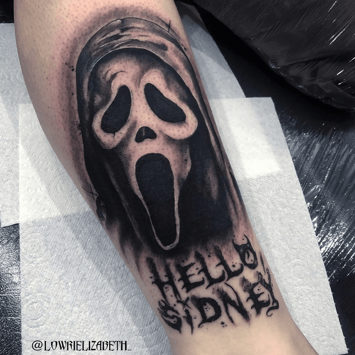 Tattoo of screaming hand by Jim Phillips