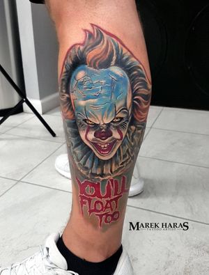 Vibrant and detailed illustrative clown tattoo on lower leg by renowned artist Marek Unfamous Haras.
