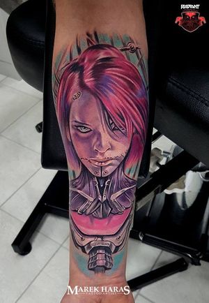 Illustrative forearm tattoo featuring a captivating woman and robot design by Marek Unfamous Haras.