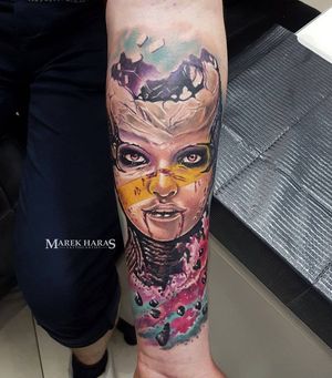 Experience the captivating beauty of Marek Unfamous Haras' surrealism with this stunning woman motif on your forearm.
