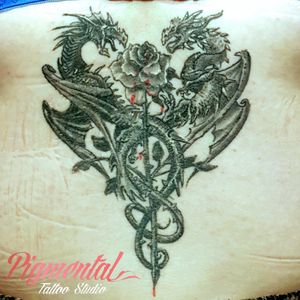 Rose and Dragons Lower Back Tattoo#Dragon #DragonTattoo #Dragons #Rose #RoseTattoo #RoseAndDragon #DragonAndRose 