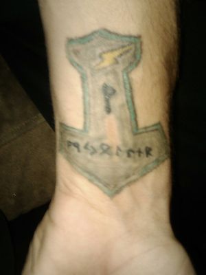 Another tattoo I did myself on my wrist as you can see I'm into Thor and Norse mythology and runes