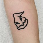 Get an eye-catching new school tattoo of a spooky ghostly figure on your arm by the talented artist Jonathan Glick.